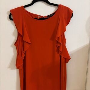 Banana Republic gently worn orange size medium blouse. Pet and smoke free home.